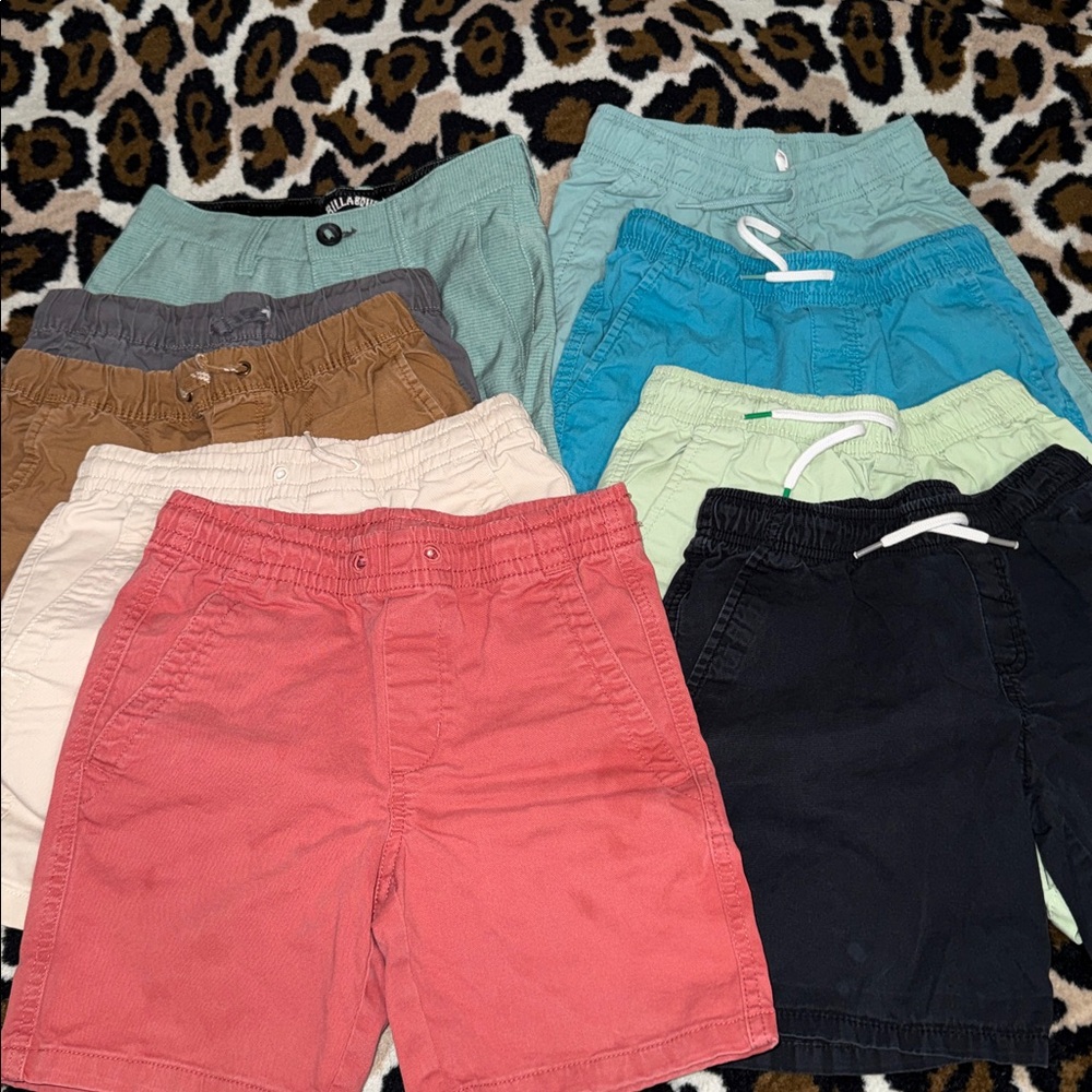 9 pairs of boys size 8 shorts.